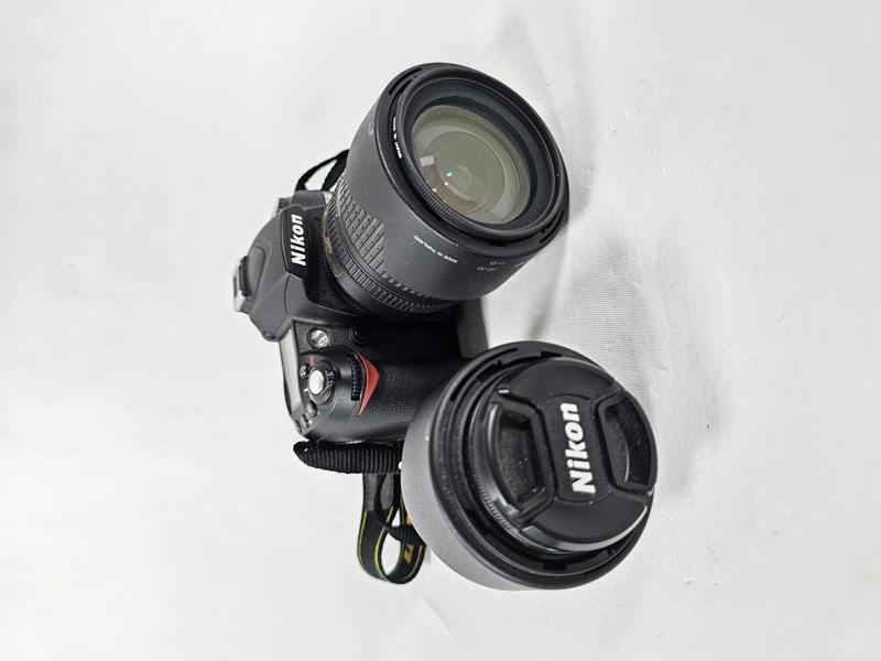 Nikon D90, Systemkamera med objektiv