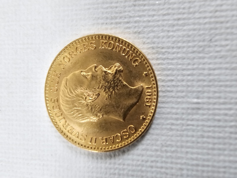 Mynt 21 k guld, 10 kr, vikt 4,5 gr