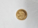 Mynt 21 k guld, 10 kr, vikt 4,5 gr