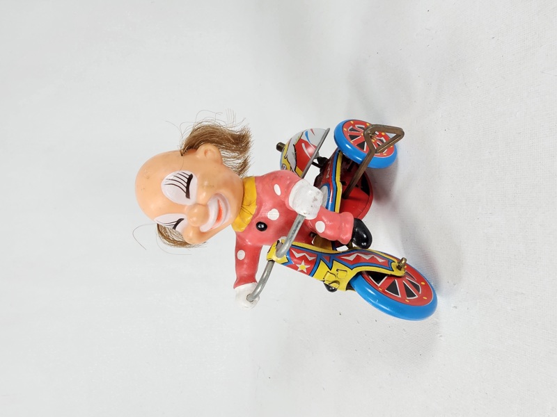 Plåtleksak, clown på cykel, tillverkad i Japan, 1950 tal.